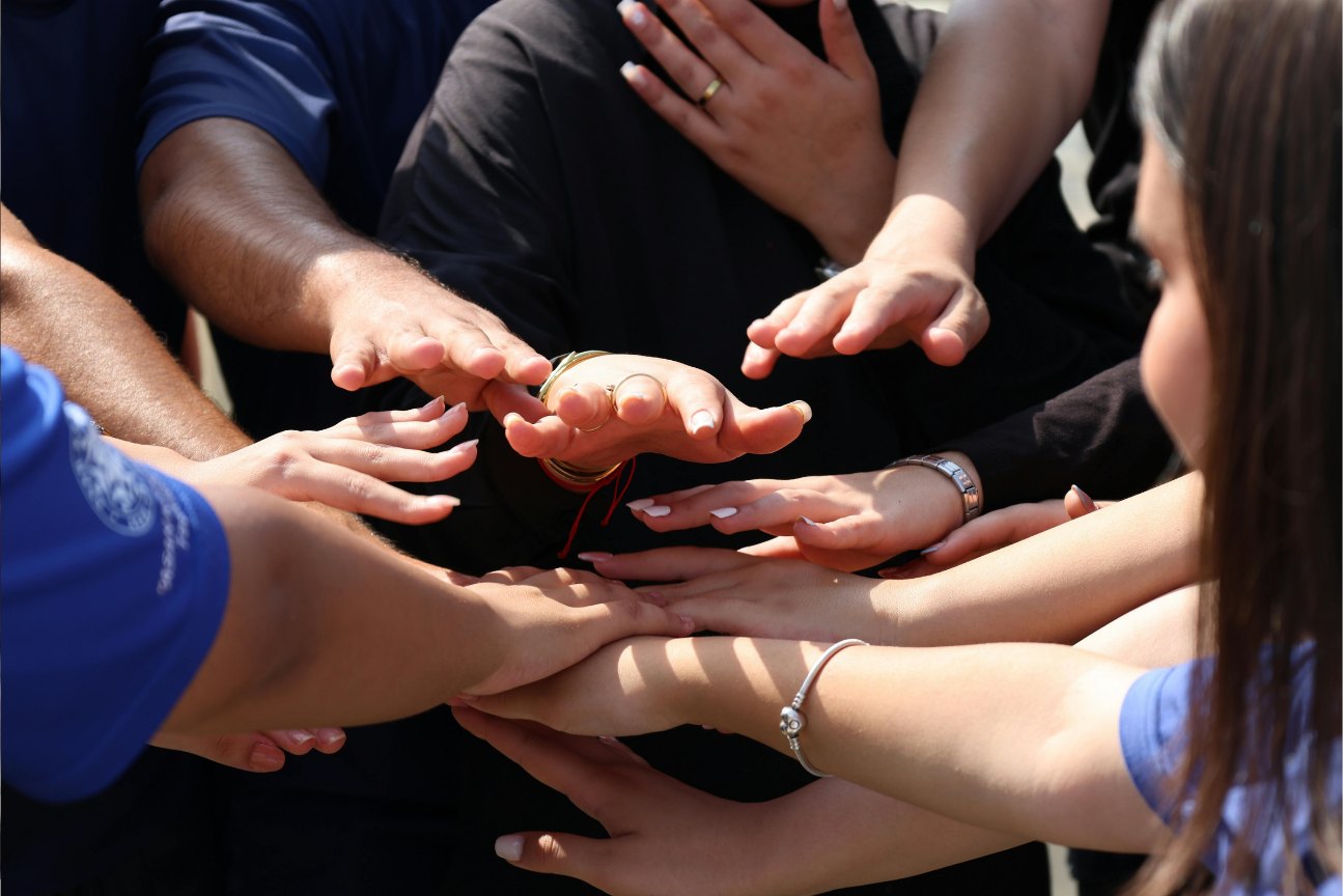 Brillersys engineers, hands together
